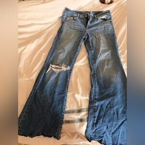 Women's Distressed flare Blue Jeans